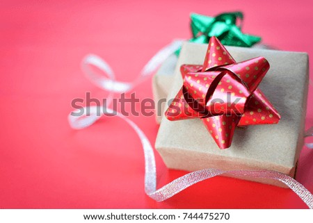 Gift box on red background for Christmas concept