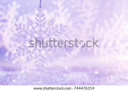 Light purple background with snowflakes. Christmas background