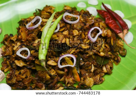 Clam or shellfish roast curry seafood South Indian recipe Kerala India.  Popular cuisine or dish in coastal area restaurants . 