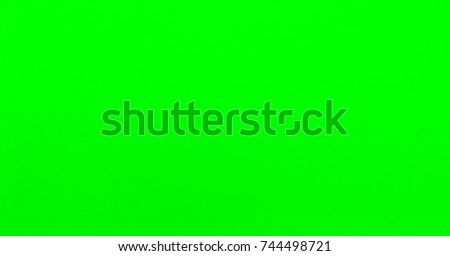 Green Screen. Green Background. Green Screen Stock Footage Video Royalty-Free Stock Photo #744498721