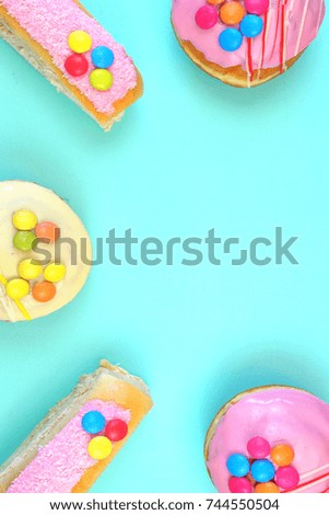 Pop Art Color style donuts and bakery goodies on bright colorful background, vertical with copy space.