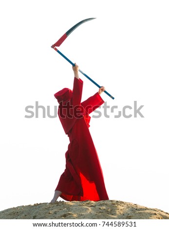 Spooky figure in red cloack with scythe
