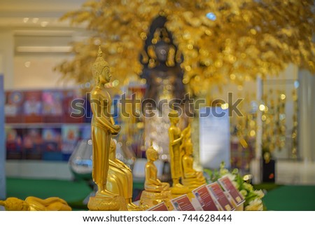 The daily Buddha statue is located in the mall, during the festival of merit making for the convenience of the Buddha