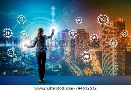 young business person and graphical user interface concept. Artificial Intelligence.  Internet of Things. Information Communication Technology. Smart City. digital transformation. Royalty-Free Stock Photo #744632632