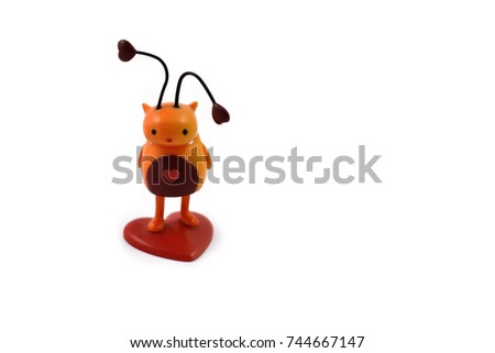 Cat toy stock images. Figurine cat. Love cat. Cat figurine on a white background