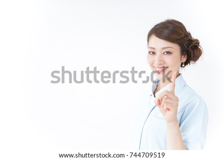 nurse pointing to something