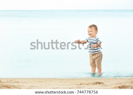 Cute little boy on beach