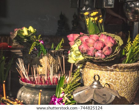 Lotus and pots with incense sticks have a scent aroma in the temple.