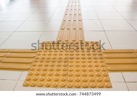 Braille block for blind handicap on the floor and split into three direction.