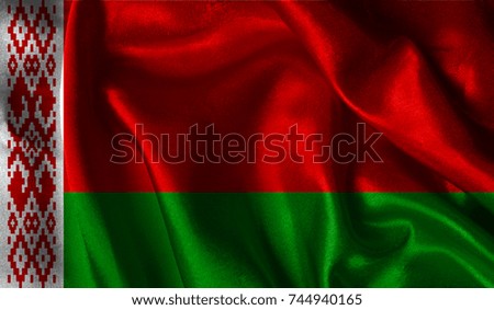 Realistic flag of Belarus on the wavy surface of fabric. This flag can be used in design.
