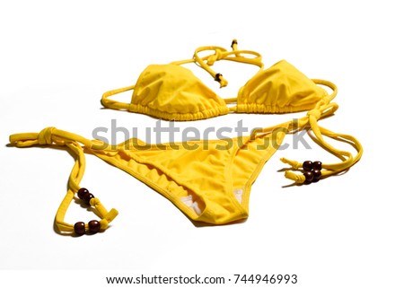 Yellow bikini on white background