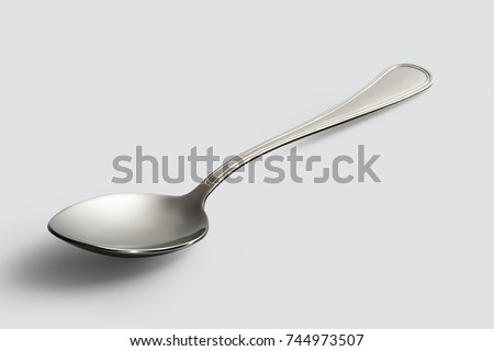 Empty steel Spoon isolated on white background Royalty-Free Stock Photo #744973507