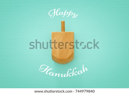 jewish holiday Hanukkah image background with traditional spinnig top.