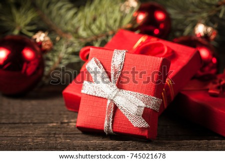 Luxury New Year gifts, different present boxes under Christmas tree in holiday eve, Christmastime celebration, home decorated with festive shiny balls, magic night