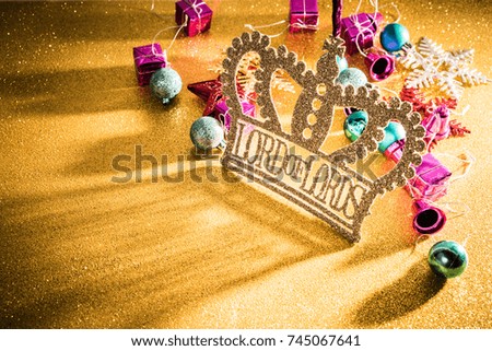 The christmas decorations on gold background