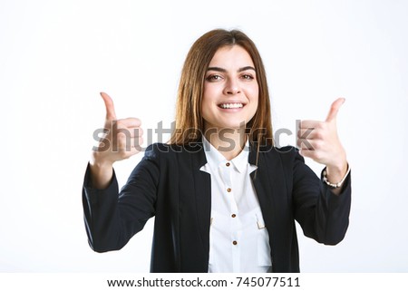 Beautiful caucasian brunette businesswoman wears black jacket show thumb up sign on white isolated background with copyspace