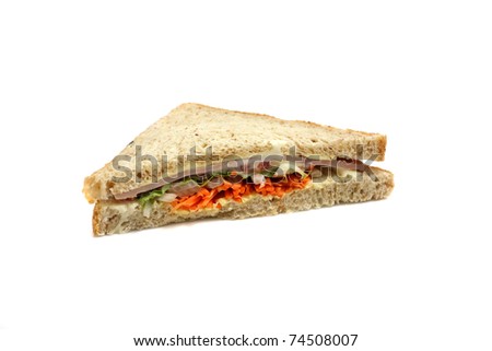 sandwich with ham and vegetables on white background