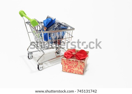 Christmas gift boxes in mini shopping cart / trolley