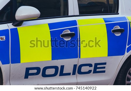 Close up of Police Car, Left Side with Police Name and Colours, horizontal photography