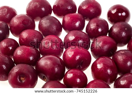 luscious frozen cherry isolated on white background, delicious first class organic fruit as a concept of summer vitamins