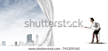 Businesswoman pulling white blank fabric. Place for text