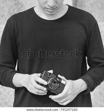 Young man photographer leisure lifestyle portrait