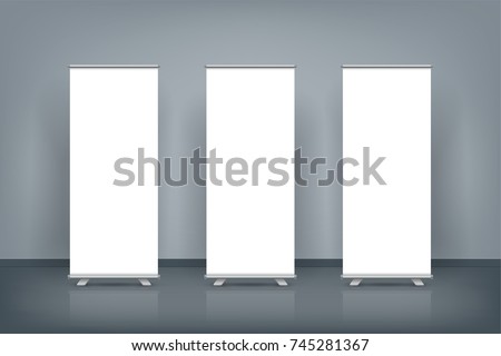 Three blank roll up banner posters display in dark blue wall, Mock up.vector illustration Royalty-Free Stock Photo #745281367