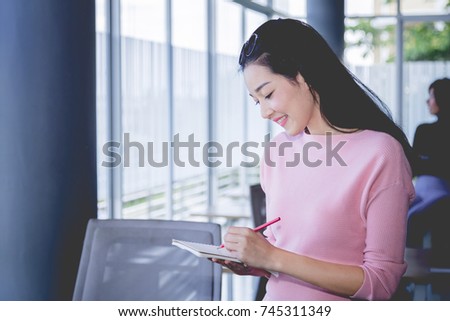 Smile of business women at a business meeting in meeting room. Business training concept.