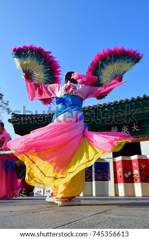 Korean Traditional Fan dance, The Chinese characters in the photo were Daeseongjeon Shrine  Royalty-Free Stock Photo #745356613