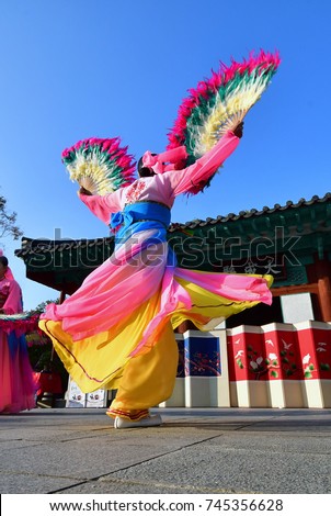 Korean Traditional Fan dance, The Chinese characters in the photo were Daeseongjeon Shrine  Royalty-Free Stock Photo #745356628