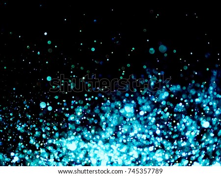 Abstract aqua blue bokeh background.Can be used wallpaper texture and background. Bokeh with copy space area for a text.