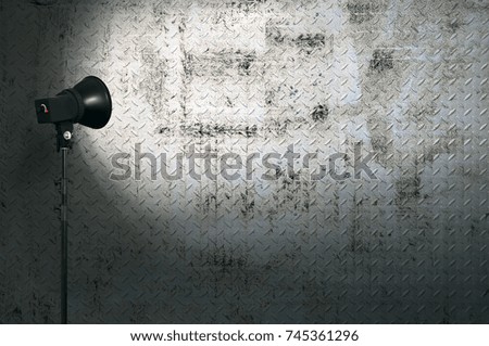 spot light on metallic wall