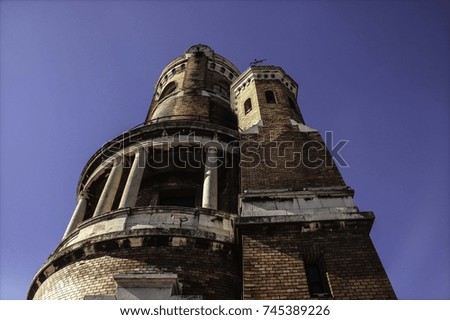 Old,antique,vintage tower building with a beautiful sky view