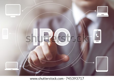 IPO (Initial Public Offering) icon finance business concept. Businessman pressing button ipo on virtual trading computer screen.