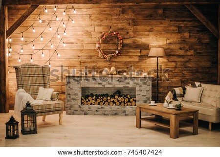 Autumn interior in the studio with a fireplace
