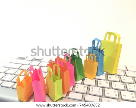 The colorful shopping bag. Concept of holiday/ on-line/ on sale shopping addiction/ holiday. Blurred, soft focus.