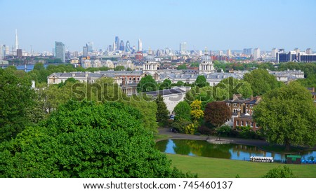  Photo from famous Park of Greenwich with famous Observatory and views to isle of Dogs, Canary Wharf, London, United Kingdom                               