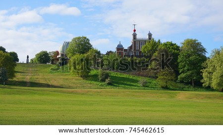  Photo from famous Park of Greenwich with famous Observatory and views to isle of Dogs, Canary Wharf, London, United Kingdom                             