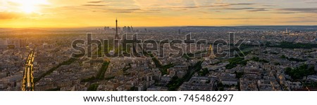 Skyline of Paris with Eiffel Tower in Paris, France. Panoramic sunset view of Paris. Eiffel Tower is one of the most iconic landmarks of Paris. 