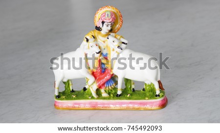 Bhagwan Krishna with cow