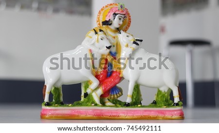 Bhagwan Krishna with cow