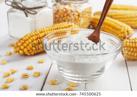Starch and corn cob on the table Royalty-Free Stock Photo #745500625