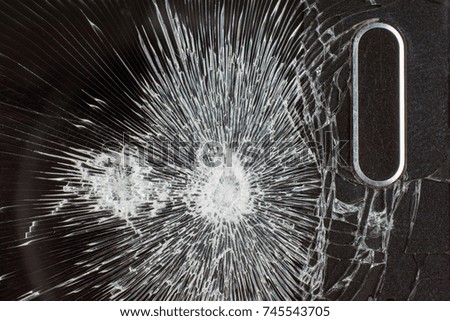 broken phone glass, cracks on the phone glass copyspace, selective focus