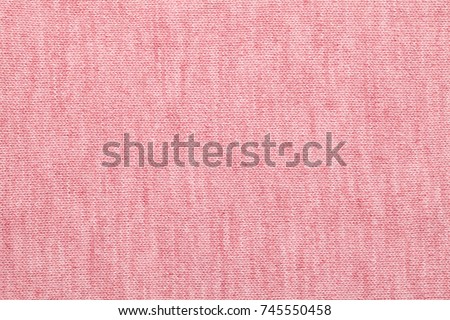 Real red knitted fabric made of heathered yarn textured background Royalty-Free Stock Photo #745550458