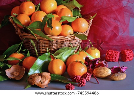 mandarin oranges in a wicker basket 