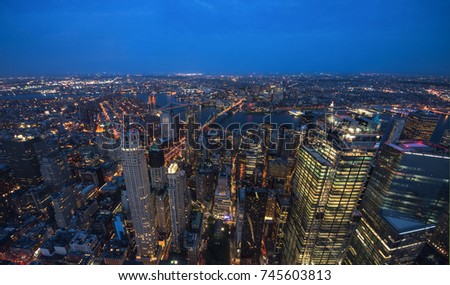 Big Apple after sunset - new york manhattan at night, aerial view of New York