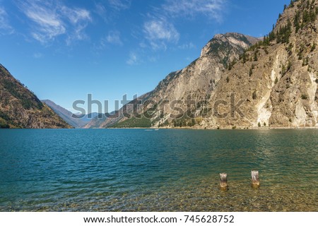 Seton lake near Lillooet British Columbia Canada high mountains with blue sky