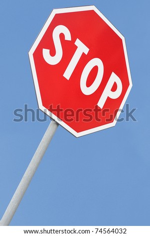 Stop road sign with falling perspective