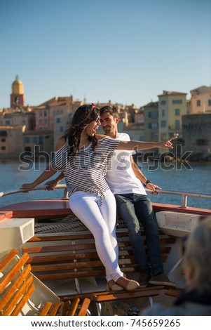 Smiling Couple Happy on Boat Ride at Saint-Tropez, Cote d'Azur, France