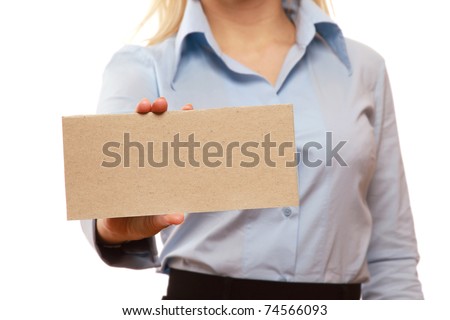 A businesswoman holding a blank, focus on the blank
